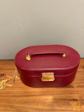 Vintage Wolf Designs burgundy leather travel jewelry case With Key 1960's